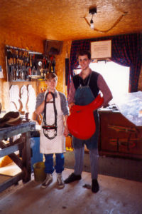 Jochen's first shop: Steve & Jochen (his first apprentice) showing the first coloured saddle (bought by Ralph Lauren for Polo through Spinneybeck).